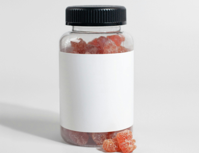 Jar of gummies showing the difference between CBD vs Amanita mushrooms.