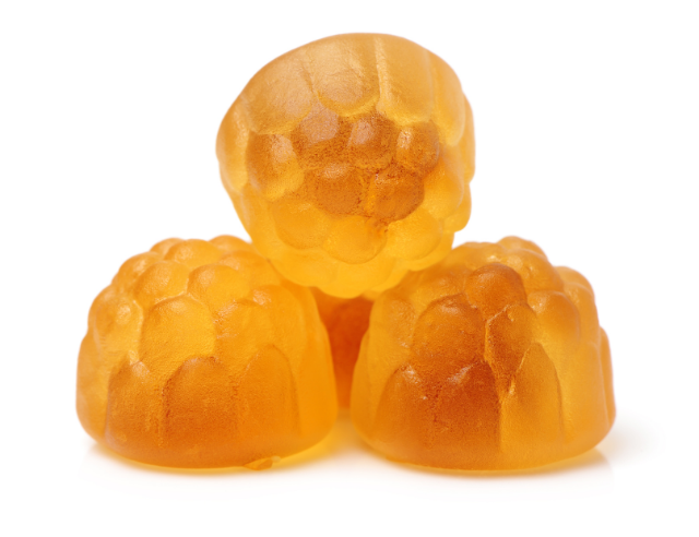 Pile of gummies showing the difference between CBD vs Amanita mushrooms.