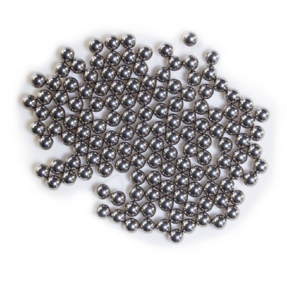 Dynavap ball vape core balls scattered on a white background in groups of circles.