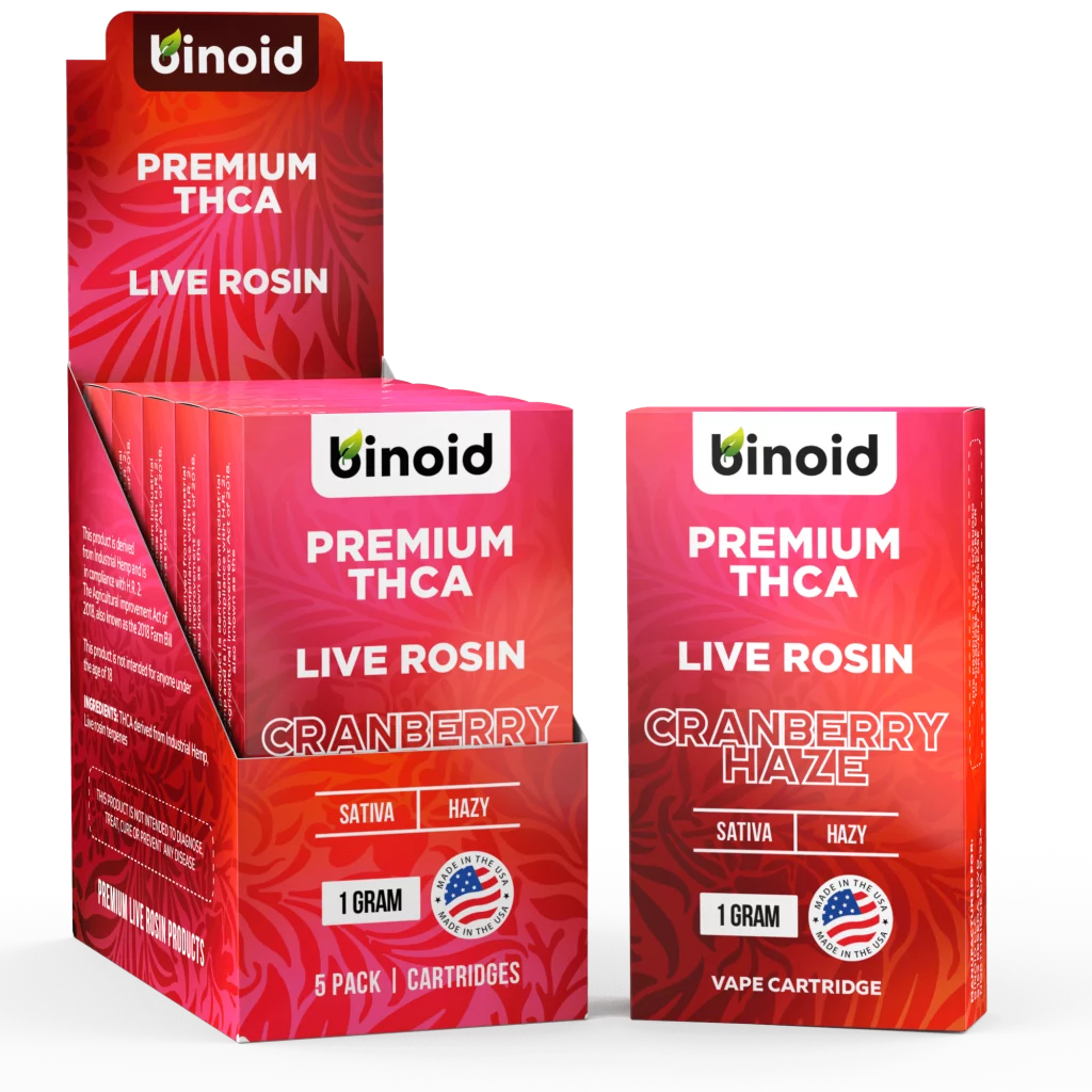 A set of premium thca live rosin vape beside a single disposable red cart.