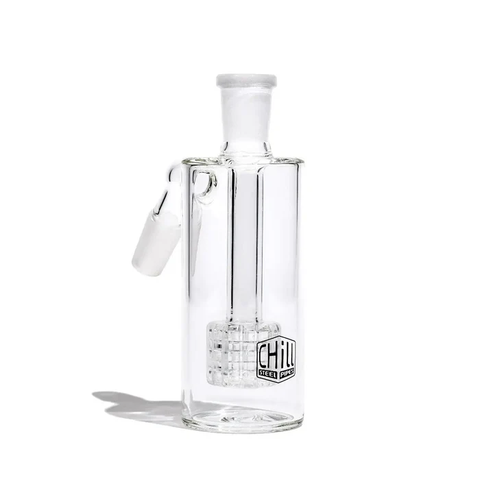 Glass ash catcher attached to a chill steel pipe displayed in front of a white background.