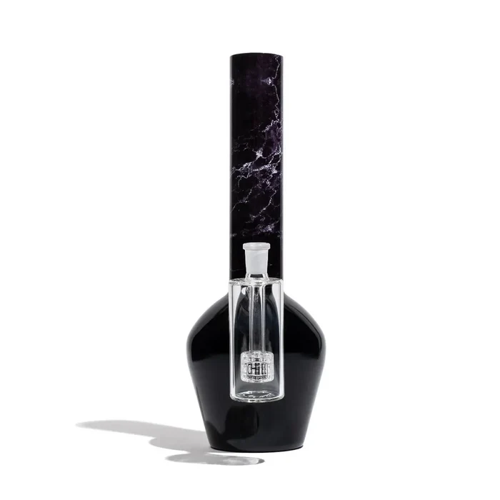 Glass ash catcher attached to a chill steel pipe displayed in front of a white background.