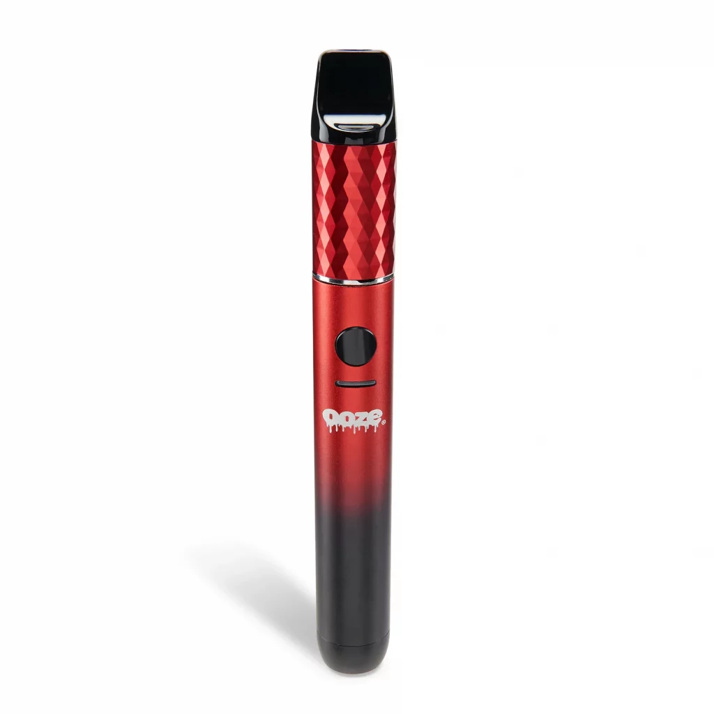 The extract vaporizer being displayed in front of a colorful background.