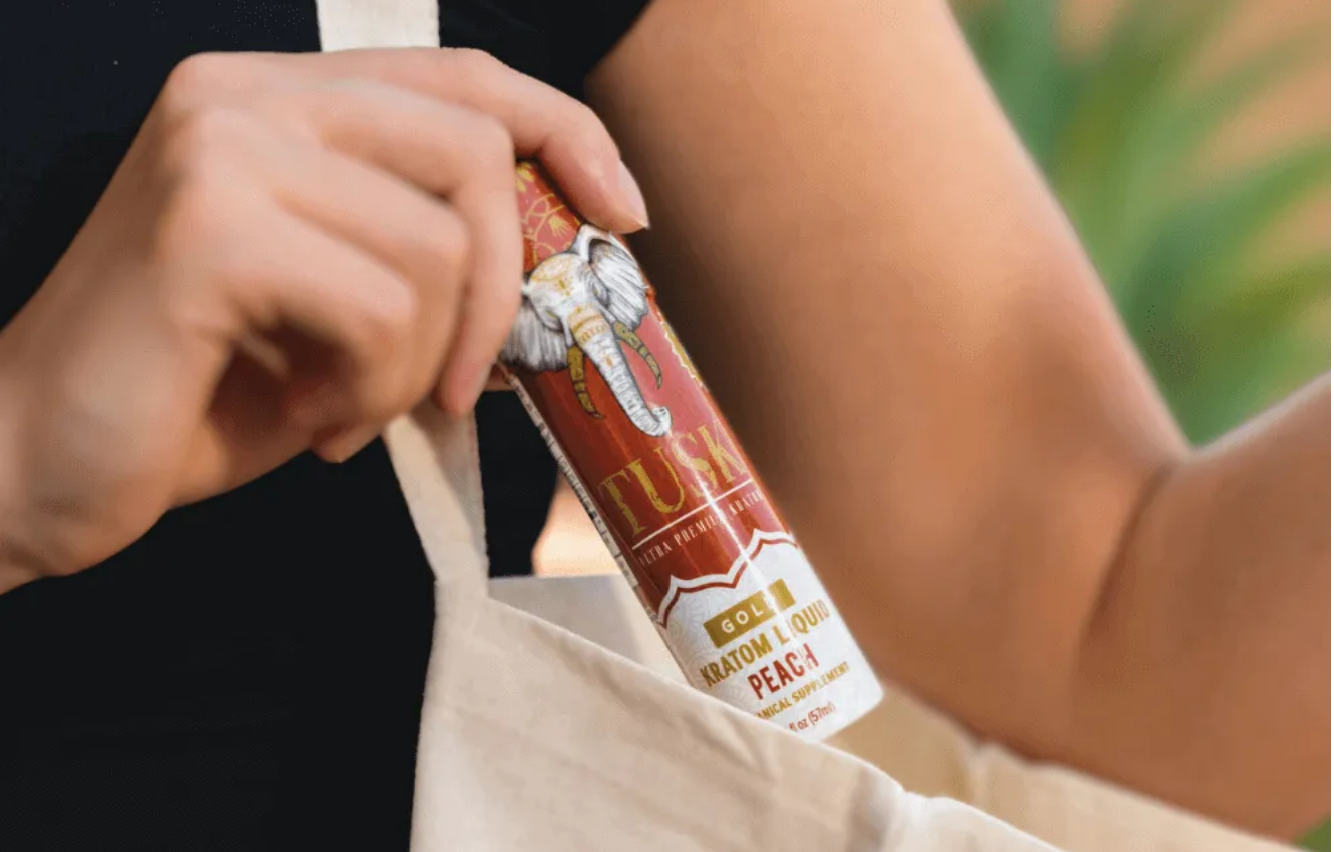 Best Kratom Extract Powder Packets displayed in front of a colorful background.