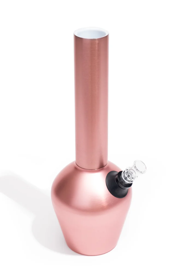 A durable bong for smokers displayed in front of a white background with its shadow shown behind.