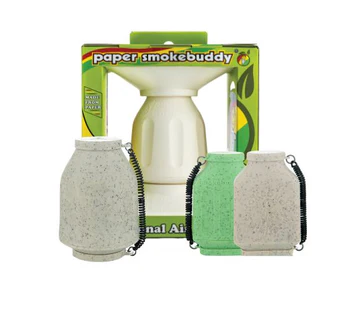 Personal smoke filters displayed in front of a white background, one that is white with a box and another green one.