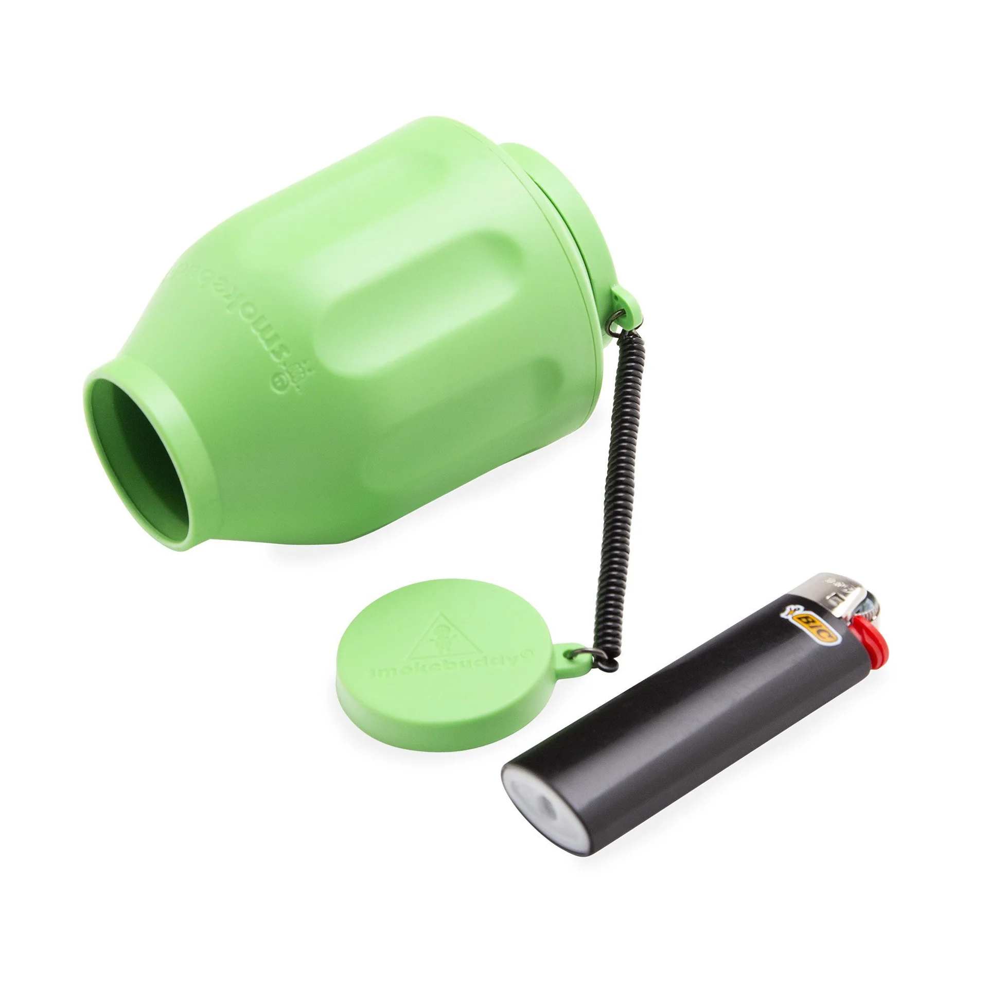 One of Smokebuddy's best selling green personal air filters for smoking displayed sideways on the floor with a torch beside it.