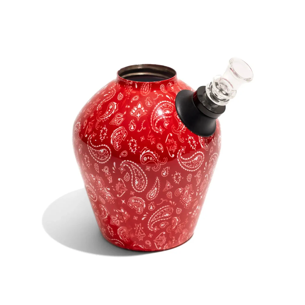 A red cold bong without its pipe displayed in front of a white background.