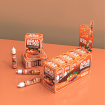 Orange kratom drink mix from Tusk Kratom Aqua Bliss displayed on an orange table in front of a gray wall.