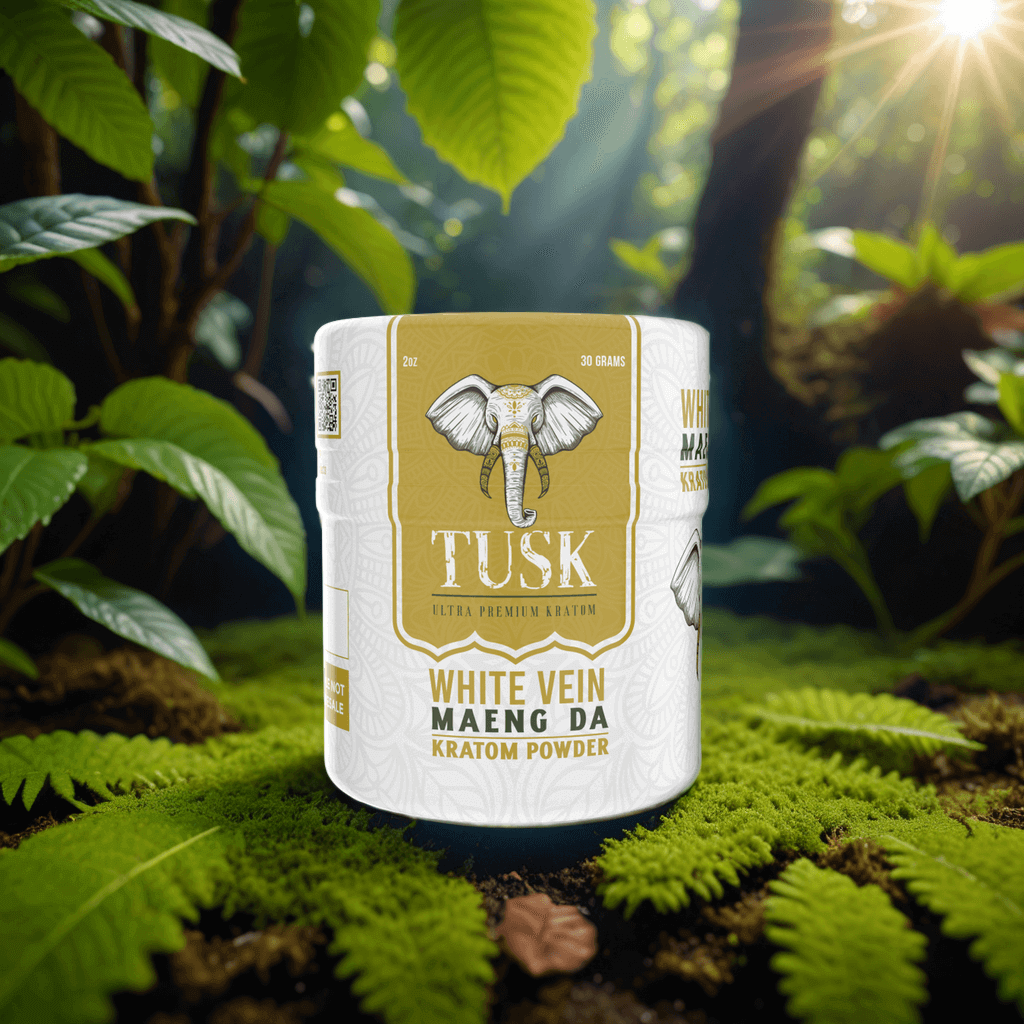 Kratom powder taste depicted by a yellow Tusk Kratom Powder product displayed above forest leaves in a jungle background.