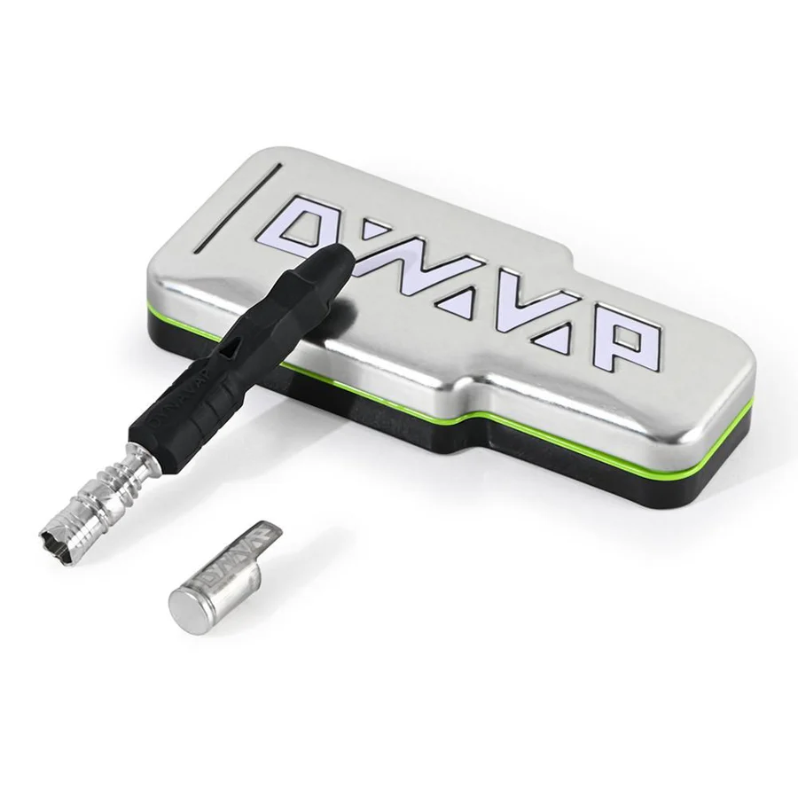 Dynavap The B2 and its silver package displayed on top of a white floor and white background.