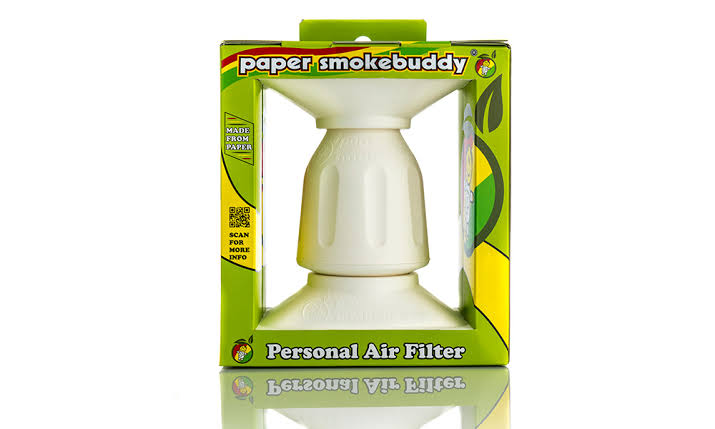 How to smoke discreetly being shown by a white Smokebuddy device displayed inside its package in front of a white background.