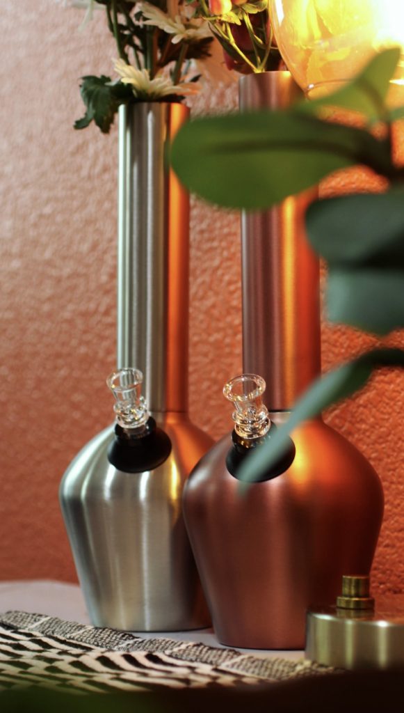 Copper and stainless steel bongs styled as the best bong for fall decor on a tabletop