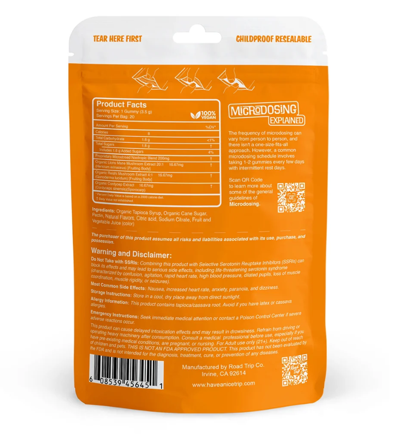 Microdosed gummies in orange blend shown in front of a white background with oranges and the packet.