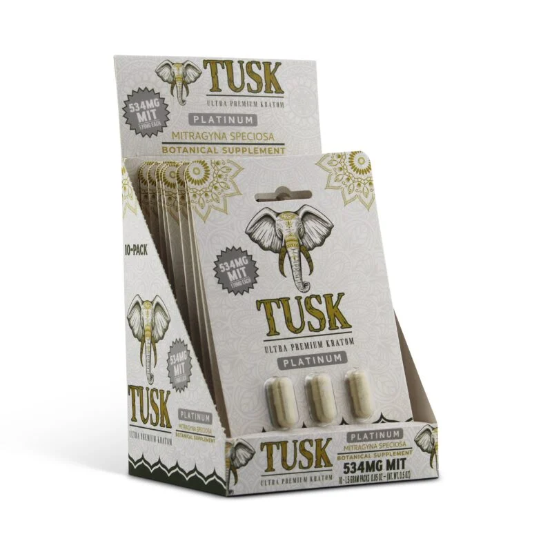 Kratom beverage product from Tusk Kratom showing kratom capsules and the packaging with the box displayed in front of a white background.